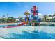 Community water park featuring water slides, wading pool, and various water play structures at 8940 Rhodes St, Kissimmee, FL 34747