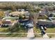 Aerial view of a home featuring solar panels on the roof and a spacious backyard, outlined in red at 9544 Brimton Dr, Orlando, FL 32817