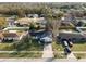 Aerial view of a home featuring solar panels on the roof and a spacious backyard in a quiet neighborhood at 9544 Brimton Dr, Orlando, FL 32817