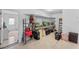 Large storage room with a large workbench and plenty of storage space at 9544 Brimton Dr, Orlando, FL 32817