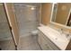 Clean bathroom with a glass-enclosed shower, white vanity, and neutral-toned walls at 1104 Southampton Dr # 3, Port Orange, FL 32129