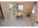 Dining nook with a table with four chairs and a window at 1104 Southampton Dr # 3, Port Orange, FL 32129