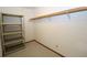 Walk-in closet featuring wire shelving and carpeted floors at 1104 Southampton Dr # 3, Port Orange, FL 32129