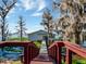 Waterfront home accessible by long boardwalk at 12104 Lakeshore Dr, Clermont, FL 34711