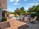 Outdoor patio area with an in-ground pool perfect for outdoor dining and relaxation at 12104 Lakeshore Dr, Clermont, FL 34711