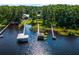 Scenic aerial view of waterfront homes with docks and serene water views at 13344 S Lake Mary Jane Rd, Orlando, FL 32832