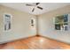 Bedroom featuring hardwood floors, a ceiling fan, and good natural lighting at 1523 Silver Star Rd, Orlando, FL 32804