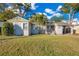 Charming single-story home with well-maintained lawn, mature trees and covered parking at 1523 Silver Star Rd, Orlando, FL 32804