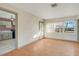 Living room boasts wood flooring and natural light at 1523 Silver Star Rd, Orlando, FL 32804