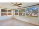 Sun room with neutral walls and tiled floors surrounded by several windows allowing for ample natural light at 1523 Silver Star Rd, Orlando, FL 32804