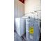 Utility closet with A.O. Smith water heater and washing machine at 1523 Silver Star Rd, Orlando, FL 32804