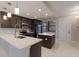 Contemporary kitchen featuring sleek countertops, stainless steel appliances, and stylish lighting at 16300 County Road 455 # 305, Montverde, FL 34756