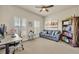 Cozy bedroom featuring neutral tones, natural light, and comfortable seating at 1725 Prospect Ave, Orlando, FL 32814