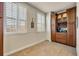 Charming breakfast nook features plantation shutters, tiled floor, and a coffee bar area with wine rack at 1725 Prospect Ave, Orlando, FL 32814