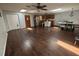 Spacious living room with hardwood floors, skylights, and an open layout perfect for entertaining guests at 210 Dartmouth St, Deltona, FL 32725
