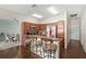 Well-lit kitchen featuring stainless steel appliances and breakfast bar seating at 2537 Rock Pl, Poinciana, FL 34759