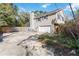 Two-story home with an attached garage, driveway, and lush landscaping at 259 Westchester Dr, Deland, FL 32724