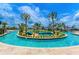 A resort-style lazy river winds through lush landscaping at 3007 Penelope Loop, Kissimmee, FL 34746