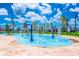 Community splash pad offers residents a colorful outdoor water park with multiple fountains at 3007 Penelope Loop, Kissimmee, FL 34746