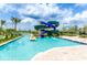 Resort-style water park features lazy river, spiraling water slide, and palm trees at 3007 Penelope Loop, Kissimmee, FL 34746