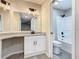 Bathroom featuring updated vanity, lighting, and walk in shower at 3206 Sabal Palms Ct # A, Kissimmee, FL 34747