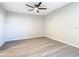 Neutral bedroom with ceiling fan and plank flooring at 3206 Sabal Palms Ct # A, Kissimmee, FL 34747