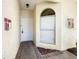 Inviting entryway with a charming front door and beautiful stucco facade at 3206 Sabal Palms Ct # A, Kissimmee, FL 34747