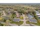 An aerial view displays the neighborhood's peaceful streets and lush green landscaping at 340 Bahia Cir, Longwood, FL 32750