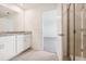 Well-lit bathroom with granite counters, a walk-in shower, and tiled floors at 3507 Salvia Ct, Tavares, FL 32778