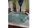 Close up of a luxurious hot tub with clear blue water at 40201 Jericho Trl, Eustis, FL 32736