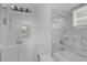 Clean bathroom with a marble tiled shower and modern vanity at 4228 Lenox Blvd, Orlando, FL 32811