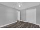 Bedroom featuring hardwood floors, a ceiling fan, and closet at 4228 Lenox Blvd, Orlando, FL 32811