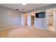 Spacious carpeted main bedroom with ensuite bathroom and walk-in closet at 4416 Flagg St, Orlando, FL 32812