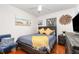 Cozy bedroom featuring a warm color palette, hardwood floors, and an airy ceiling fan at 445 Autumn Oaks Pl, Lake Mary, FL 32746