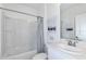 Clean bathroom with a tub/shower combination and a stylish vanity sink area at 4759 Cloister St, Kissimmee, FL 34758