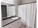 Bathroom features a vanity with ample counter space and storage, offering a clean and functional design at 6408 Raleigh St # 2402, Orlando, FL 32835