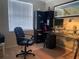 Office with bright natural lighting and a modern desk at 7138 Hiawassee Bent Cir, Orlando, FL 32818