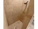 Close up of a tiled walk-in shower with a rainfall shower head and tile flooring at 8348 Via Rosa, Orlando, FL 32836