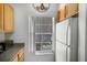 Bright kitchen window with white blinds allowing plenty of natural light at 8523 Crystal Cove Loop, Kissimmee, FL 34747