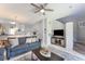 View of living room with kitchen to the left and stairs to the right at 8523 Crystal Cove Loop, Kissimmee, FL 34747