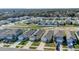 Community aerial view showing multiple homes and manicured yards at 863 August Sky Dr, Deltona, FL 32738