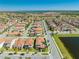 Aerial shot showcases the community, featuring single Gathering homes and an inviting community at 9406 Mere Pkwy, Orlando, FL 32832