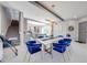 Dining area with modern decor, a marble dining table, and stylish chairs at 9406 Mere Pkwy, Orlando, FL 32832