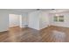 Bright, open-concept living space features new floors and fresh paint at 1026 Woodall Dr, Altamonte Springs, FL 32714