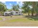 Backyard view of the home and gazebo at 1037 N Virginia Ave, Winter Park, FL 32789