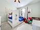 Charming bedroom with a custom bunk bed, teddy bears and reading nooks at 14143 Ancilla Blvd, Windermere, FL 34786