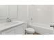 Bathroom featuring a bathtub-shower combo, modern toilet and sleek vanity at 1417 Arbor Hill Dr, Deltona, FL 32725