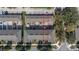 Aerial view of townhomes showcasing private back patios and convenient layout at 14203 Avenue Of The Grvs, Winter Garden, FL 34787