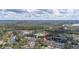 Beautiful aerial shot of townhouses nestled among trees, offering a blend of comfort and natural beauty at 14203 Avenue Of The Grvs, Winter Garden, FL 34787