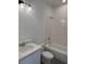 Clean bathroom with a combination of a bathtub, shower, and modern lighting at 1453 Arbor Hill Dr, Deltona, FL 32725